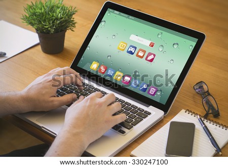 Businessman at work. Close-up top view of man working on laptop with computer. all screen graphics are made up.