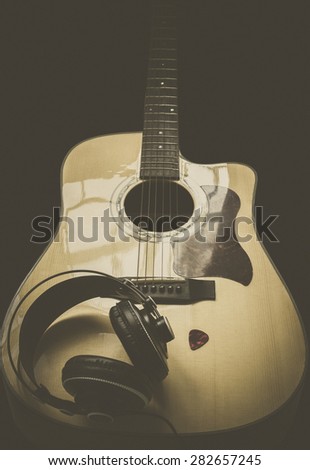 Guitar ,headphone and guitar pick