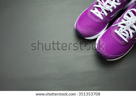 Purple Sneakers with black background