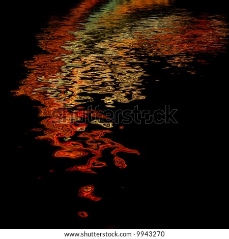 Abstract of Electric lighting night time water reflection