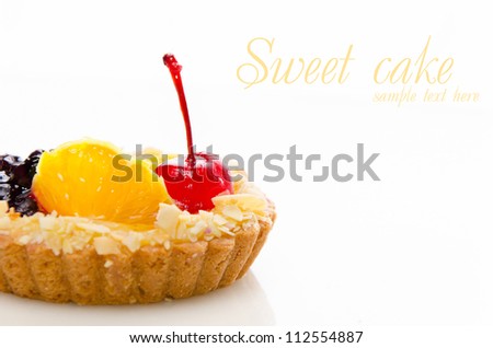 Sweet cake with cherry and a place for the text