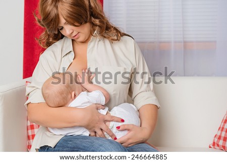 Mother nurses the child