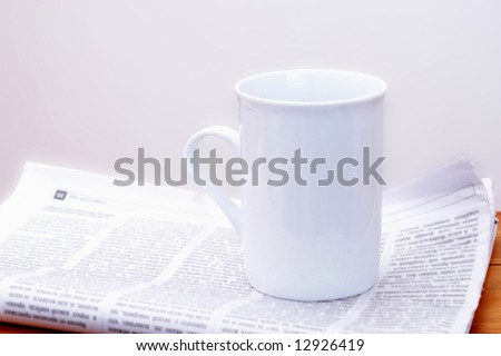 White cup, copyspace for logo.
