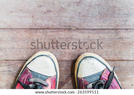 vintage shoes on wooden board