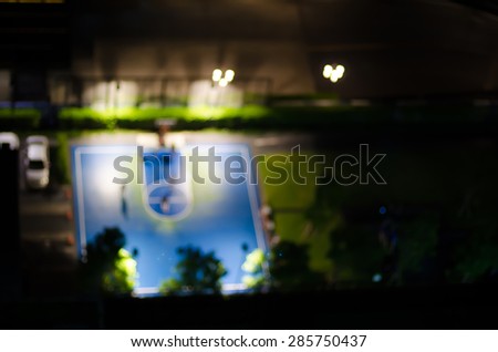 motion blur.basketball players play basketball in night light