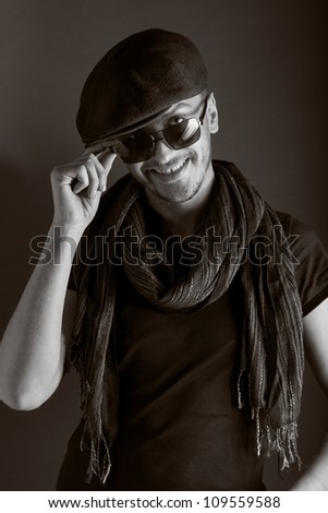 handsome young guy posing with hat