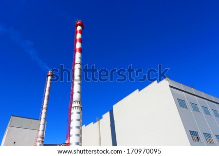 Exterior of industrial factory with chimneys