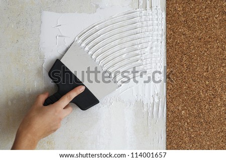 make a smear for stick cork the wallpaper