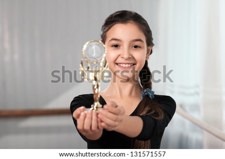 little girl dancer shows Cup win