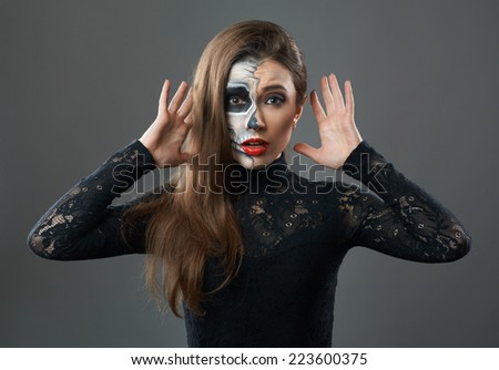 Surprised woman with make-up skeleton