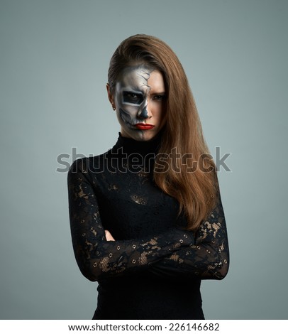 beautiful  pouted woman with make-up skeleton