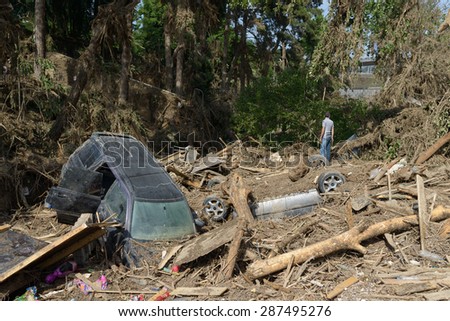 Georgia, Tbilisi, zoo. 15 june 2015: a car in a pile of debris after floods