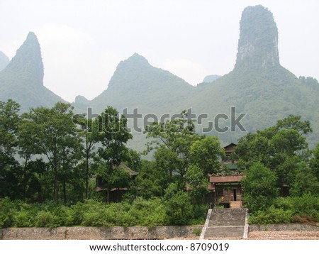 A stairway and gate on the river banks of the Li river in Guilin China.