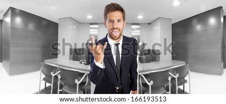 young man disagree gesture in office or waiting room