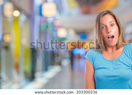 amazed woman in a shopping center
