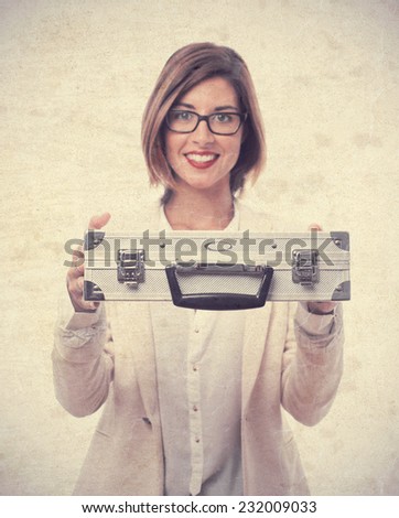 young cool woman with a steel briefcase