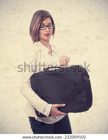 young cool woman with a suit case