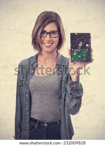 young cool woman with broken hard disk
