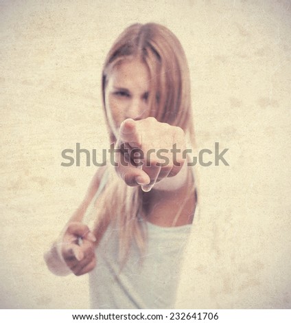 young cool woman pointing you