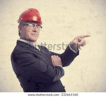 senior cool man architect pointing