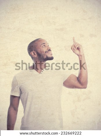 young cool black man pointing up