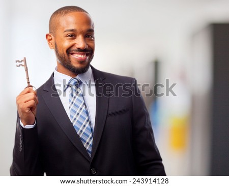 young cool black man with an old key