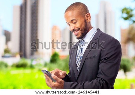 young cool black man with touch screen phone