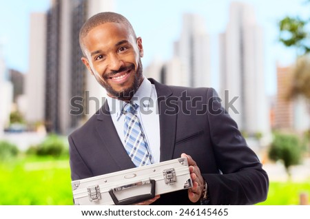 young cool black man with steel briefcase