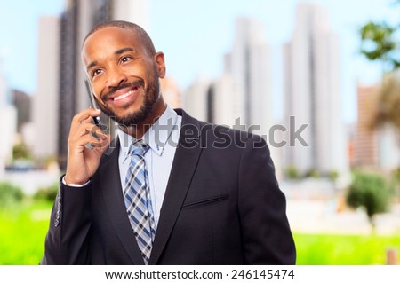 young cool black man speaking on phone