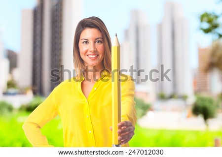 young cool woman with a pencil
