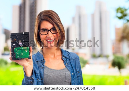 young cool woman with broken hard disk