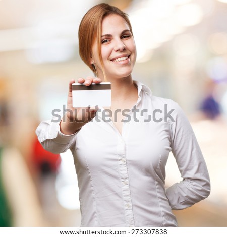 blond woman with credit card