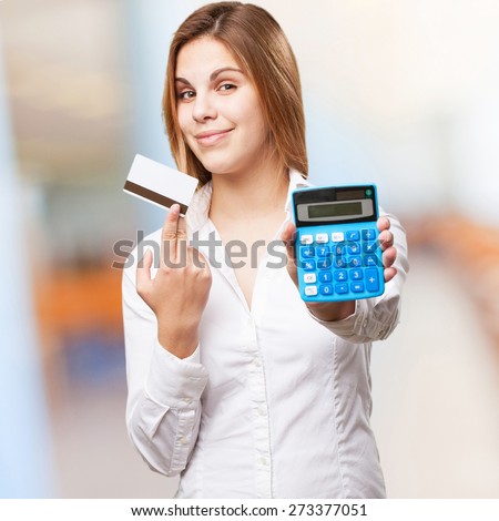 blond woman with calculator and credit card
