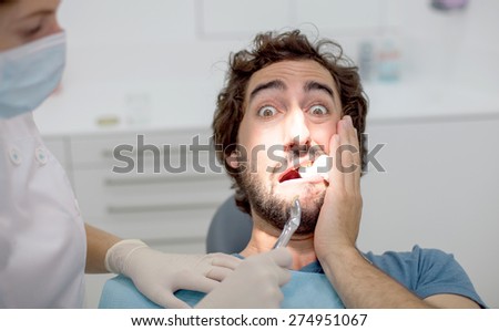 crazy man with pain. dentist concept