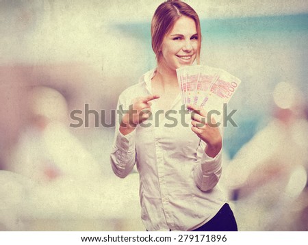 blond woman with money