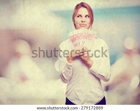 blond woman with money