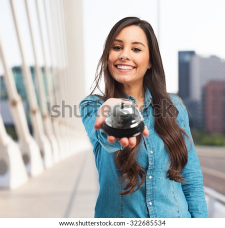 happy young woman with ring bell