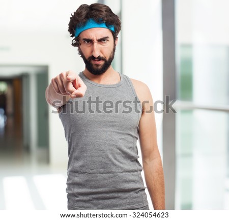 angry sport man pointing front