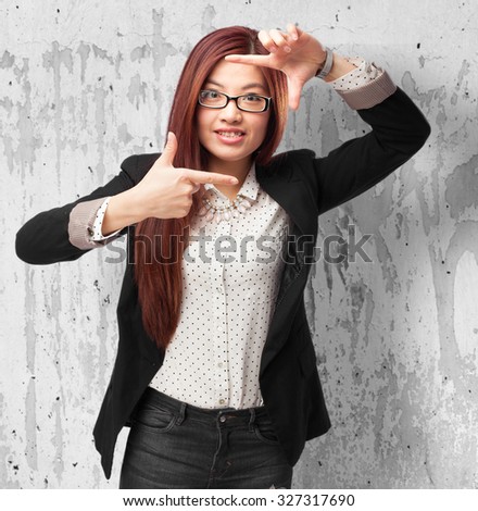 happy chinese woman frame gesture