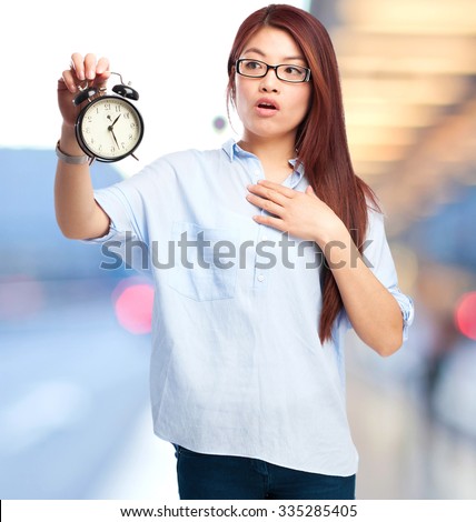 happy chinese woman with clock