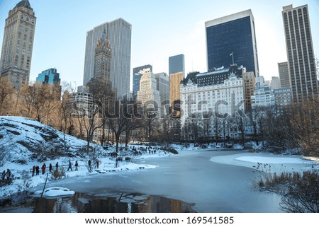 New York City Central Park and Manhattan buildings in snow