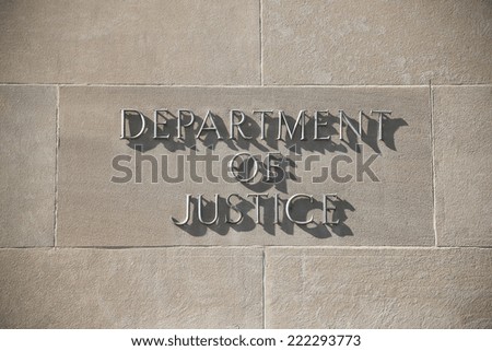 United States Department of Justice building sign in Washington D.C.