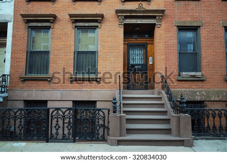 Brick wall brownstone townhouse in New York City Brooklyn