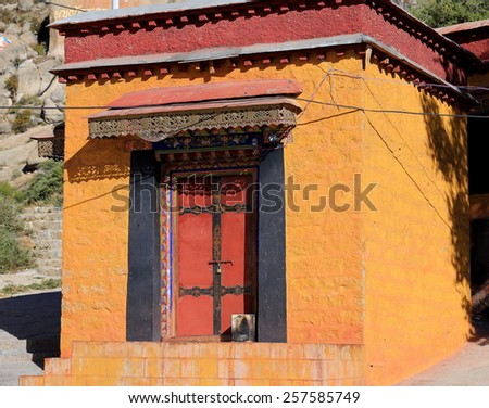 Small orange painted pavilion inside the 1416 AD.founded Drepung-Rice Heap buddhist monastery of the Gelugpa-Yellow Hat School at the foot of mr.Ghephel. Lhasa pref.-Tibet A.R.-China.