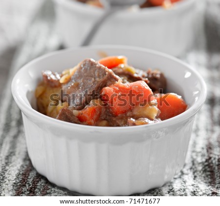 beef stew cooling off on a kitchen towel with selective focus.