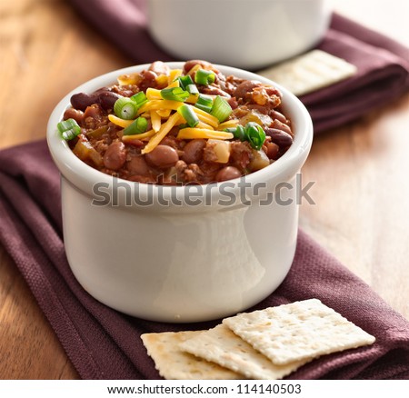 bowl of chili beef chili shot with selective focus.