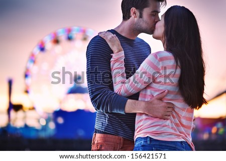 Young Couple Kissing Near Santa Monica Pier