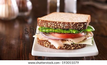 deli meat sandwich, shot at a wide aspect ratio