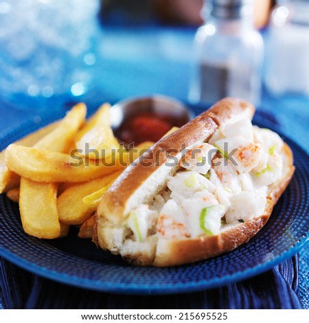 lobster roll and french fries with ketchup