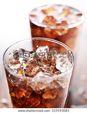 glass cup of cola soda with ice